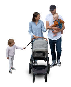 family with a baby and a stroller walking seen from above