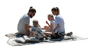cut out backlit family having a picnic outside