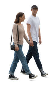 man and woman walking hand in hand
