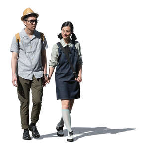 cut out young asian couple walking hand in hand