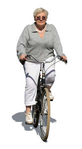 cut out older woman riding a bike