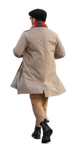 man in a trendy trenchcoat walking