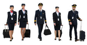 cut out air crew in uniform walking with suitcases