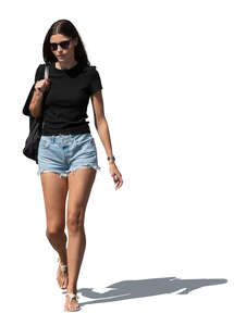 woman in denim shorts walking