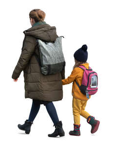 cut out mother and daughter walking hand in hand in autumn