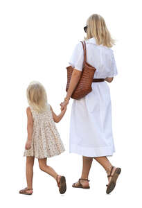woman and her daughter walking hand in hand