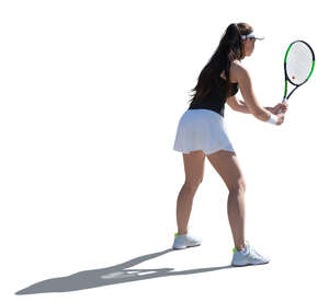 cut out backlit woman playing tennis