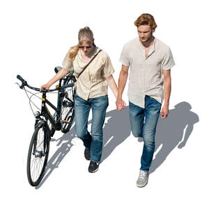 man and woman with a bicycle walking hand in hand