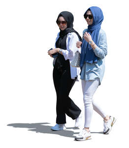 two cut out young muslim women walking