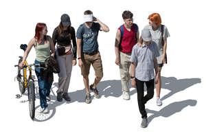cut out group of young people walking seen from higher angle