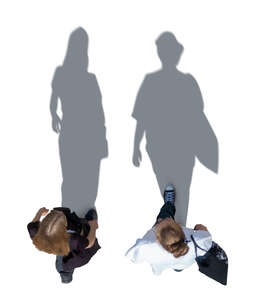 top view of two cut out women walking