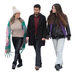 group of three friends walking on a winter day