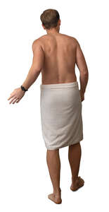 man wearing a spa towel opening a sauna door