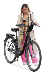 woman with a bike and a phone in her standing