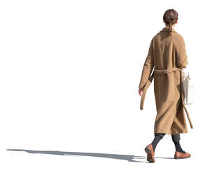 woman in a brown overcoat walking