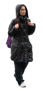 woman in a hooded jacket walking