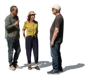 three older people standing and talking