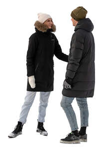 man and woman talking outside in winter