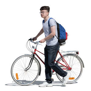 young man with a bike walking