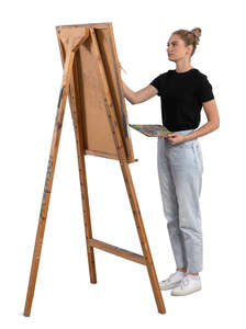 woman painting on an easel