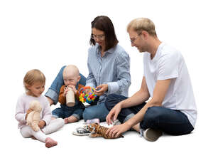 cut out family with two little kids playing on the floor