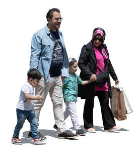 middle eastern family with two kids walking