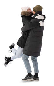 couple hugging happily in winter