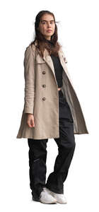 woman wearing an overcoat standing