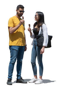 man and woman standing and eating ice cream