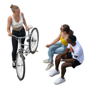 top view of a woman with a bike talking to two friends