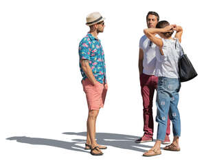 group of three people standing outside in summer and talking