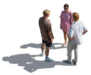 backlit top view of three people standing