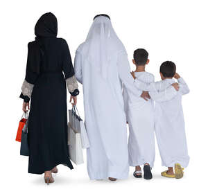 traditional arab family walking