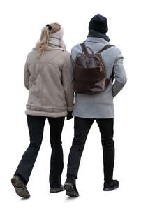 couple in grey overcoats walking