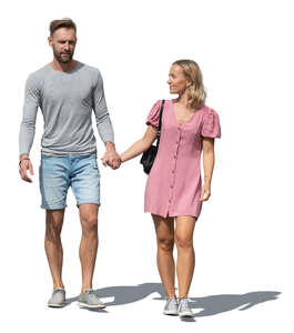 couple holding hands and walking in summer