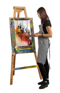 woman at an art class painting