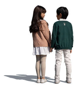 two asian kids standing hand in hand