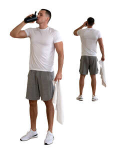 cut out man standing in the gym and drinking in fron of the mirror