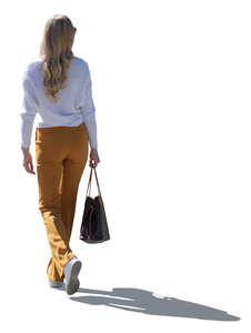 cut out backlit woman walking