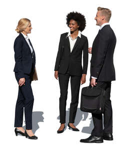 group of three office workers standing outside and talking