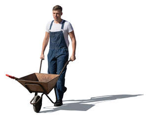 man with a wheelbarrow walking