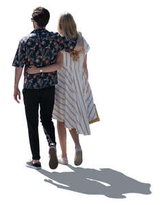 cut out backlit couple walking arms around each other