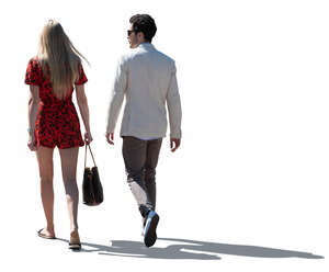 cut out backlit smart casual couple walking