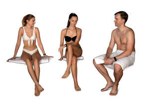 cut out group of three people relaxing in the sauna