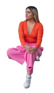 cut out woman in pink outfit sitting