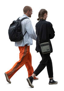 two young people walking in the street