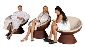 three cut out people relaxing in the spa lounge