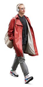 young man with a red coat walking