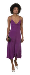 woman in a purple dress walking
