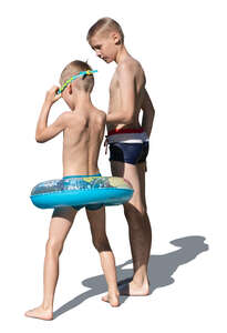 two boys preparing to go swimming